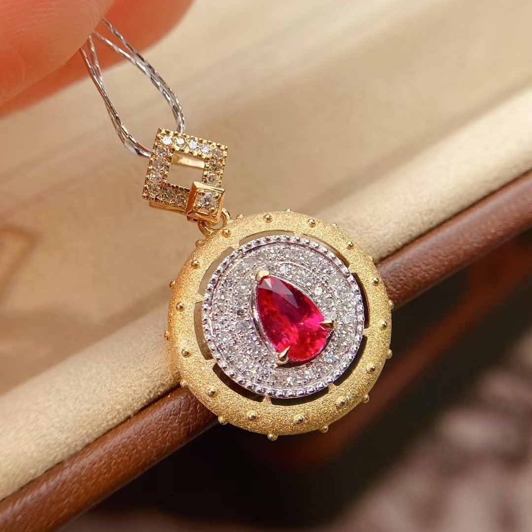 14k Gold 0.75 Ctw Natural Ruby & Diamond Pendant( Without Chain ): Ref:230998443 // gold content:14k gold // main gemstone:ruby // shape:pear // carat weight:0. 58ct // color:red // treatment:natural // // adjacent gemstone 2 : diamond // shape:round // carat