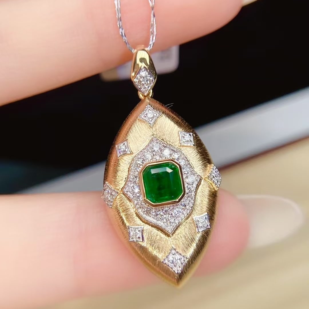 14k Gold 0.84 Ctw Vivid Green Natural Emerald & Diamond Pendant( Without Chain ): Ref:230998433 // gold content:14k gold // main gemstone:emerald // shape:octagonal // carat weight:0. 64ct // color:vivid green // treatment:natural // // adjacent gemstone 2 : diamond // shape:round 