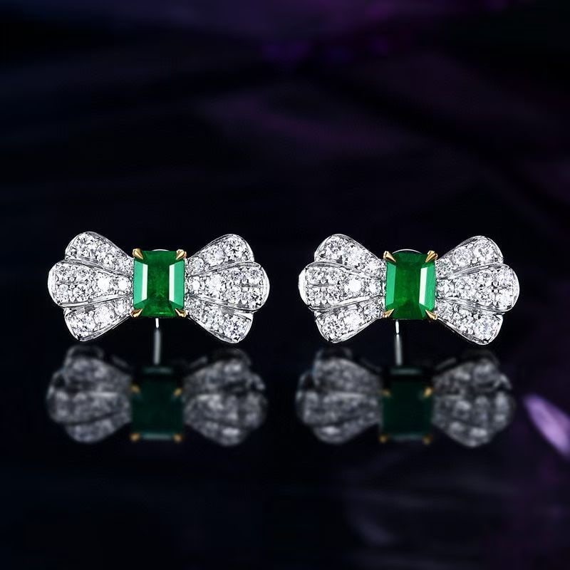 14k Gold 1.40 Ctw Vivid Green Natural Emerald & Diamond Earrings: Ref:230999011 // gold content:14k gold // main gemstone:emerald // shape:octagonal // carat weight:0. 77ct // color:vivid green // treatment:natural // // adjacent gemstone 2 : diamond // number of