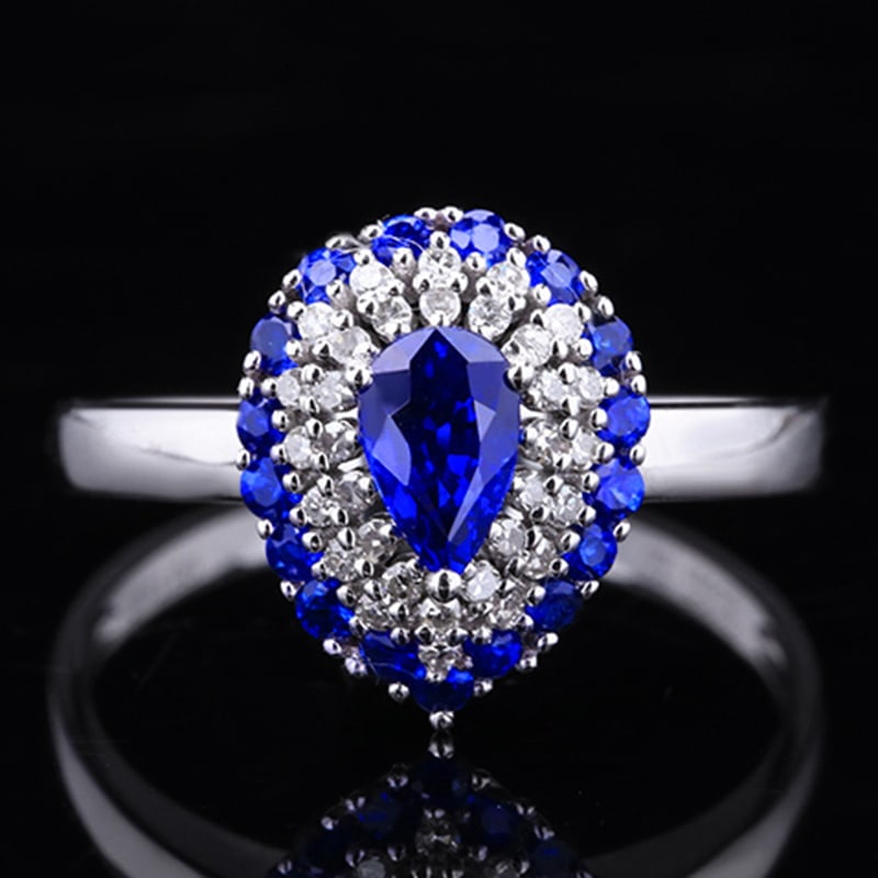 14k Gold 0.90 Ctw Natural Sapphire & Sapphire Ring: Ref:230999017 // gold content:14k gold // ring size:7. 25us // // main gemstone:sapphire // shape:pear // carat weight:0. 52ct // color:royal blue // treatment:natural // // adjacent gemstone 2 :
