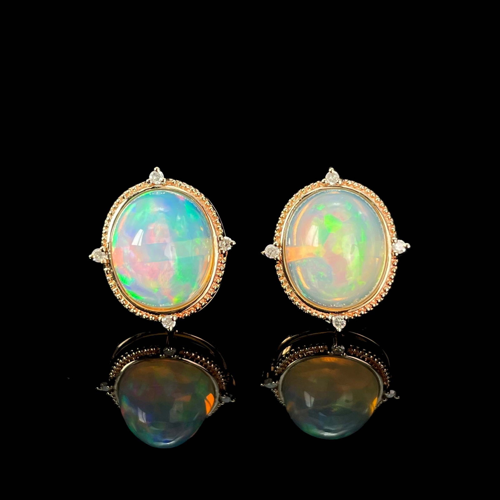 14k Gold 3.44 Ctw Natural Opal & Diamond Earrings: Ref:230999026 // gold content:14k gold // main gemstone:opal // shape:oval // carat weight:3. 4ct // color:color // treatment:natural // // adjacent gemstone 2 : diamond // shape:round // carat