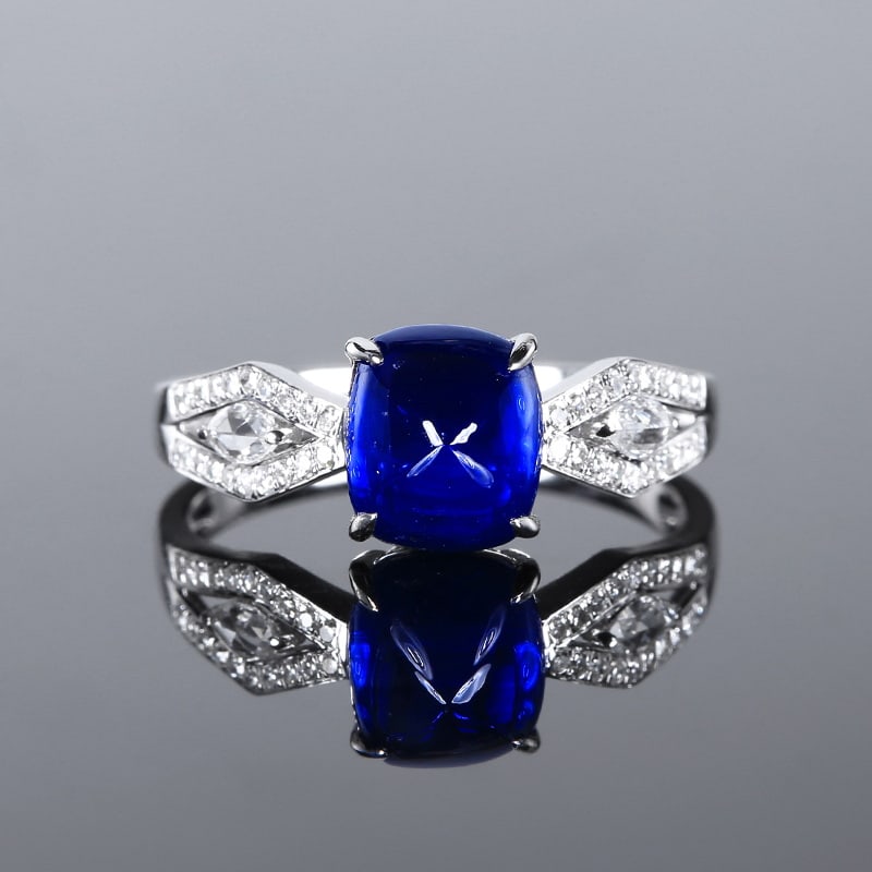14k Gold 2.76 Ctw Natural Sapphire & Diamond Ring: Ref:230999033 // gold content:14k gold // ring size:7. 25us // // main gemstone:sapphire // shape:suger-loaf // carat weight:2. 58ct // color:royal blue // treatment:natural // // adjacent gemstone 2