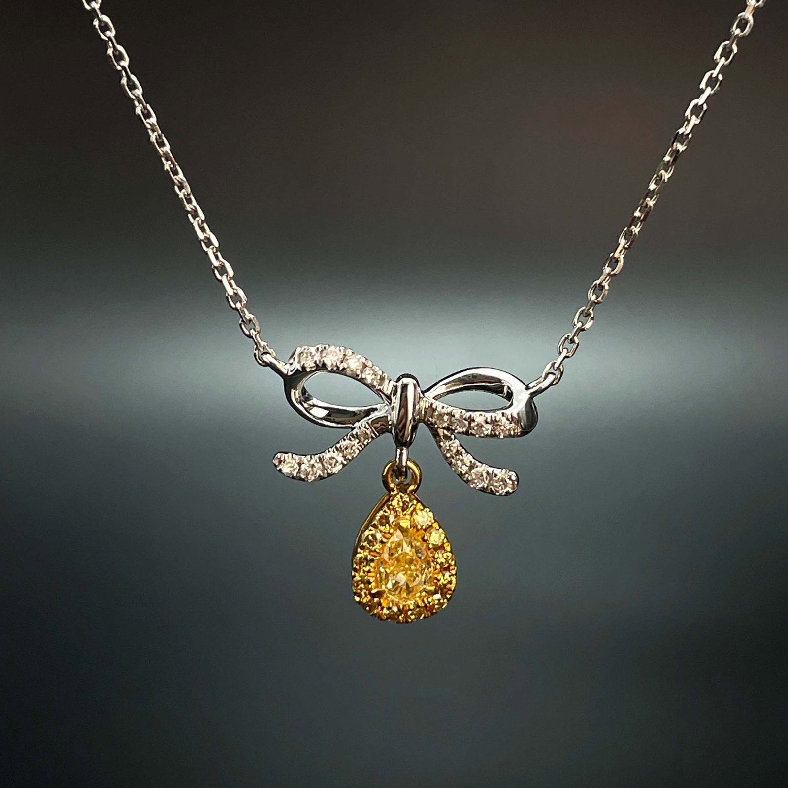 14k Gold 0.23 Ctw Natural Yellow Diamond & Diamond Necklace: Ref:230999065 // gold content:14k gold // main gemstone:yellow diamond // shape:pear // carat weight:0. 13ct // color:yellow // treatment:natural // // adjacent gemstone 2 : diamond // shape:round //