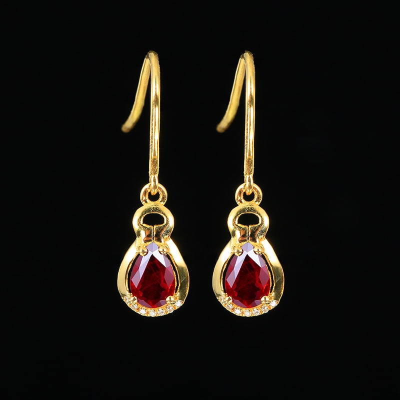 14k Gold 1.04 Ctw Natural Ruby & Diamond Earrings: Ref:230999080 // gold content:14k gold // main gemstone:ruby // shape:pear // carat weight:1. 0ct // color:red // treatment:natural // // adjacent gemstone 2 : diamond // number of stones:14 //
