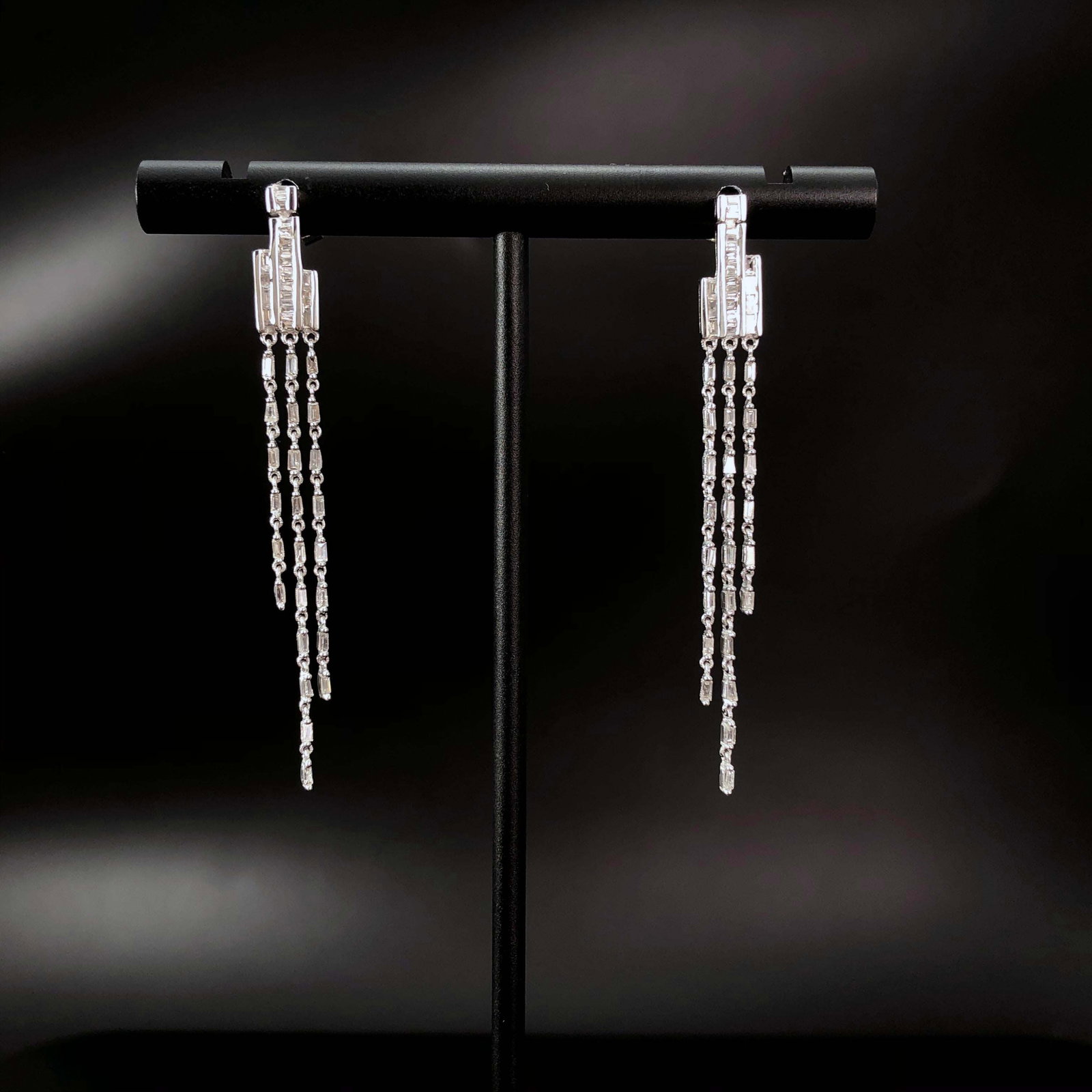 14k Gold 0.5 Ct Natural H Diamond Earrings: Ref:230999084 // gold content:14k gold // main gemstone:diamond // shape:baguette // carat weight:0. 5ct // clarity grade:vs-si // color:h // treatment:natural // Condition: New Low Estimate: 1900.00