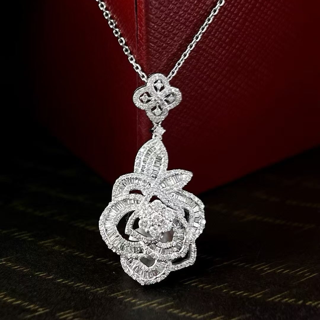 14k Gold 1.48 Ct Natural H Diamond Pendant( Without Chain ): Ref:230999100 // gold content:14k gold // main gemstone:diamond // shape:multiply // carat weight:1. 48ct // clarity grade:vs-si // color:h // treatment:natural // Condition: New Low Estimate: 4800.00