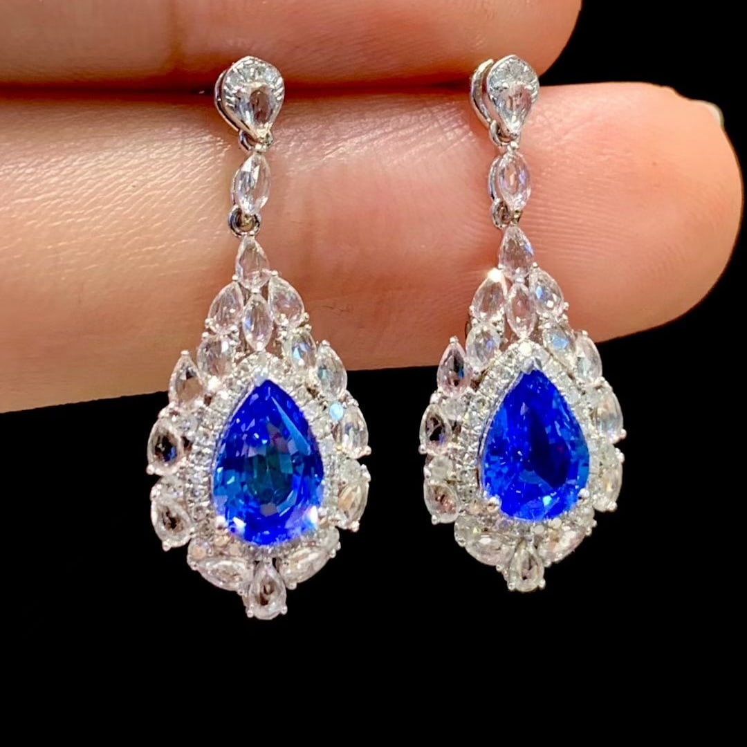 14k Gold 1.8 Ct Natural Sapphire & Diamond & Sapphire Earrings: Ref:230999125 // gold content:14k gold // main gemstone:sapphire // shape:pear // carat weight:1. 8ct // color:royal blue // treatment:natural // // adjacent gemstone 2 : diamond // shape:round // cla