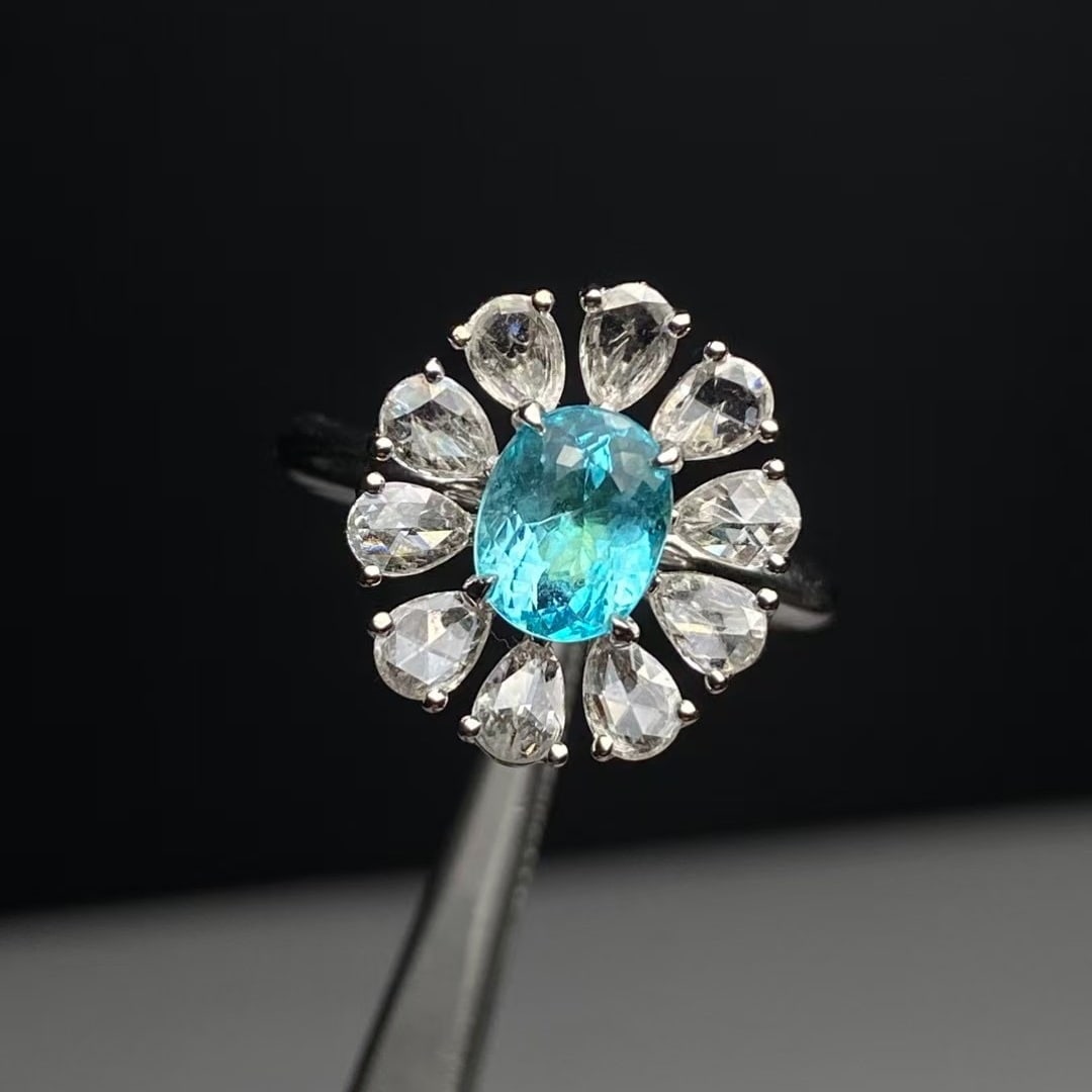 14k Gold 1.94 Ctw Natural Paraiba Tourmaline & Diamond Ring: Ref:230999139 // gold content:14k gold // ring size:7. 25us // // main gemstone:paraiba tourmaline // shape:oval // carat weight:1. 27ct // color:blue // treatment:natural // // adjacent gemstone 2 : 