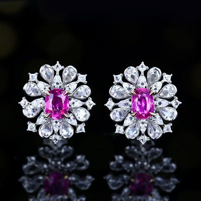 14k Gold 1.17 Ct Natural Padparadscha Sapphire & Sapphire Earrings: Ref:230999161 // gold content:14k gold // main gemstone:padparadscha sapphire // shape:oval // carat weight:1. 17ct // color:orangish pink // treatment:natural // // adjacent gemstone 2 : sapphire //