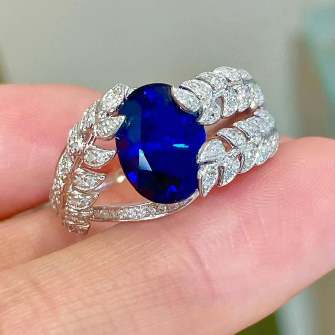 14k Gold 3.5 Ct Vivid Blue Natural Sapphire & Diamond Ring: Ref:230999188 // gold content:14k gold // ring size:7. 25us // // main gemstone:sapphire // shape:oval // carat weight:3. 5ct // color:vivid blue // treatment:natural // // adjacent gemstone 2 : diamo