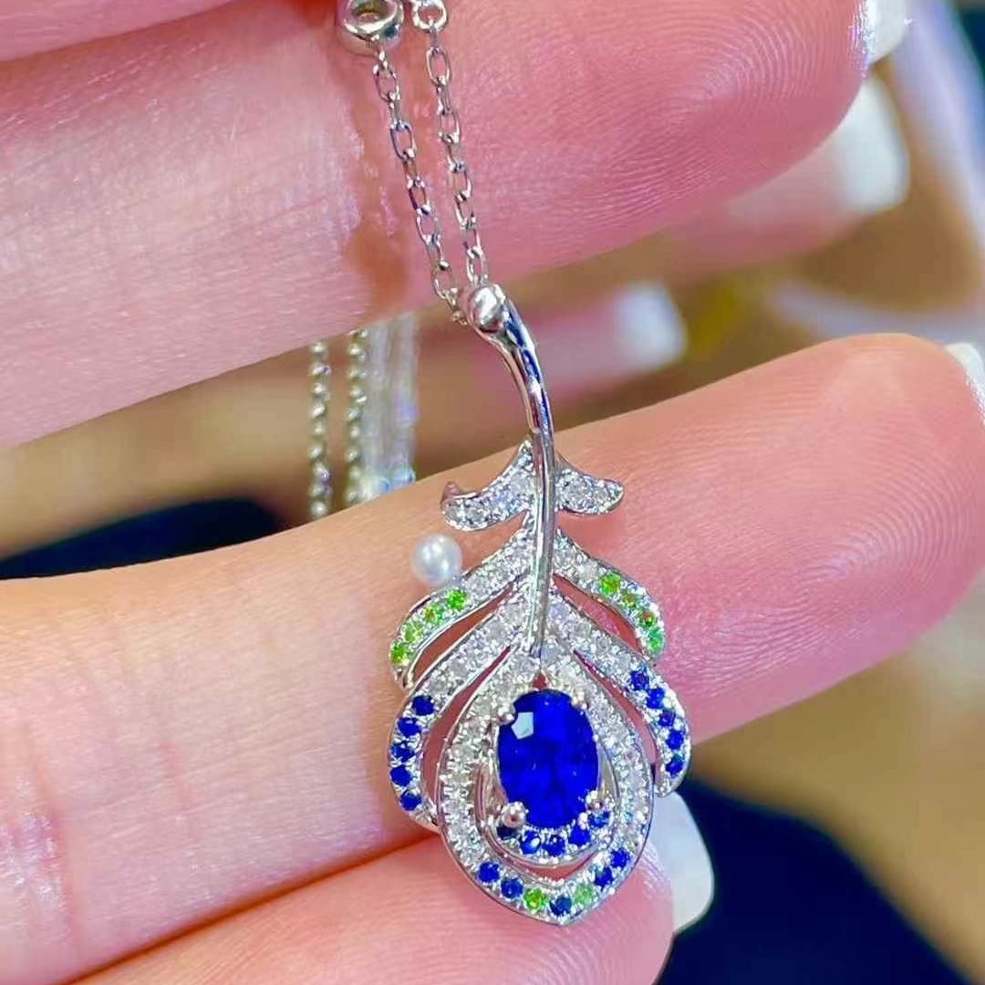 14k Gold 0.4 Ct Natural Sapphire & Diamond Pendant( Without Chain ): Ref:230999189 // gold content:14k gold // main gemstone:sapphire // shape:oval // carat weight:0. 4ct // color:royal blue // treatment:natural // // adjacent gemstone 2 : diamond // shape:round //