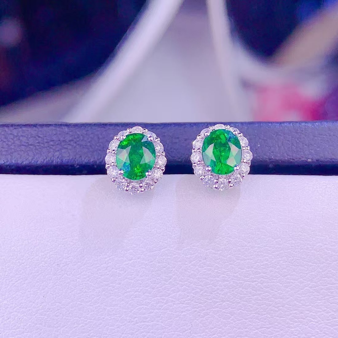 14k Gold 1.5 Ct Vivid Green Natural Tsavorite & Diamond Earrings: Ref:230999193 // gold content:14k gold // main gemstone:tsavorite // shape:oval // carat weight:1. 5ct // color:vivid green // treatment:natural // // adjacent gemstone 2 : diamond // shape:round // c