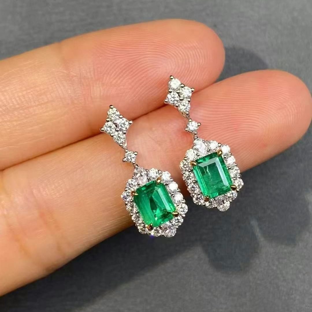 14k Gold 2.05 Ctw Vivid Green Natural Emerald & Diamond Earrings: Ref:230999226 // gold content:14k gold // main gemstone:emerald // shape:octagonal // carat weight:1. 33ct // color:vivid green // treatment:natural // // adjacent gemstone 2 : diamond // shape:multip