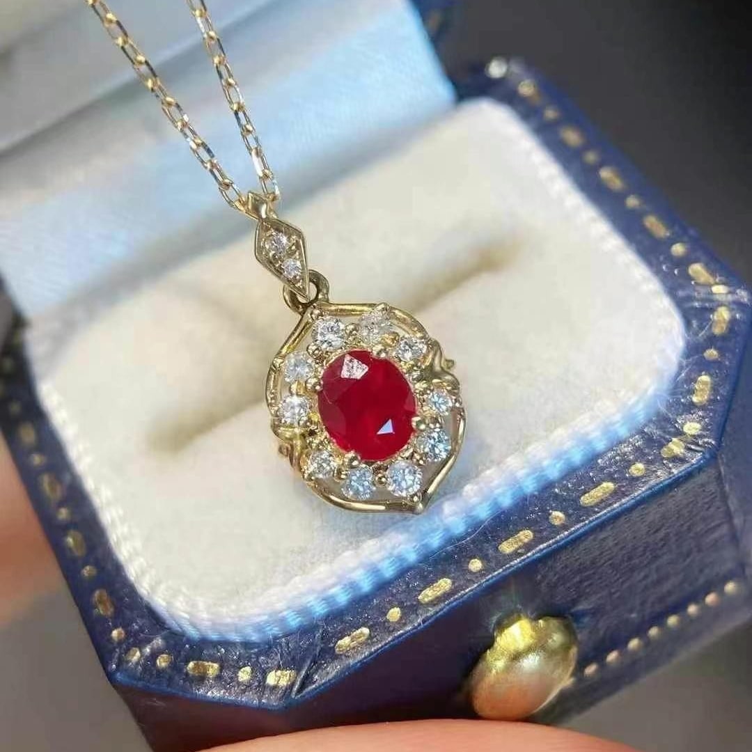 14k Gold 0.61 Ctw Natural Ruby & Diamond Necklace: Ref:230999227 // gold content:14k gold // main gemstone:ruby // shape:oval // carat weight:0. 45ct // color:pigeonblood red // treatment:natural // // adjacent gemstone 2 : diamond // shape:round //