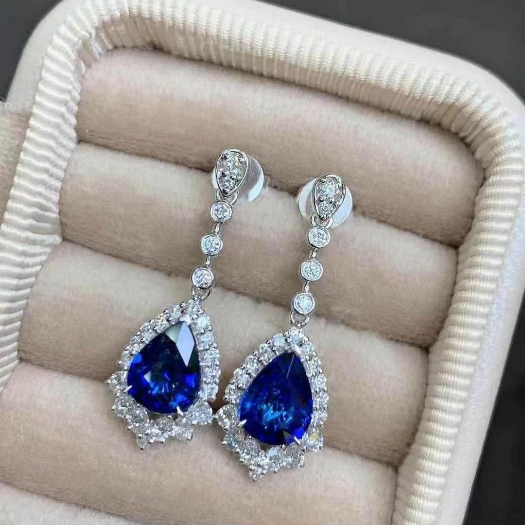 14k Gold 3.64 Ctw Natural Sapphire & Diamond Earrings: Ref:230999228 // gold content:14k gold // main gemstone:sapphire // shape:pear // carat weight:2. 92ct // color:royal blue // treatment:natural // // adjacent gemstone 2 : diamond // shape:multiply