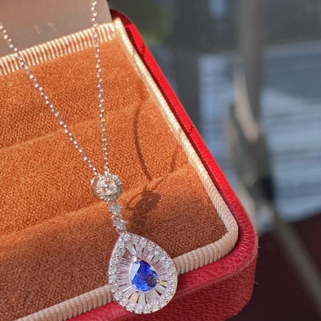 14k Gold 1.00 Ctw Natural Sapphire & Diamond Pendant( Without Chain ): Ref:230999236 // gold content:14k gold // main gemstone:sapphire // shape:pear // carat weight:0. 55ct // color:royal blue // treatment:natural // // adjacent gemstone 2 : diamond // shape:multiply