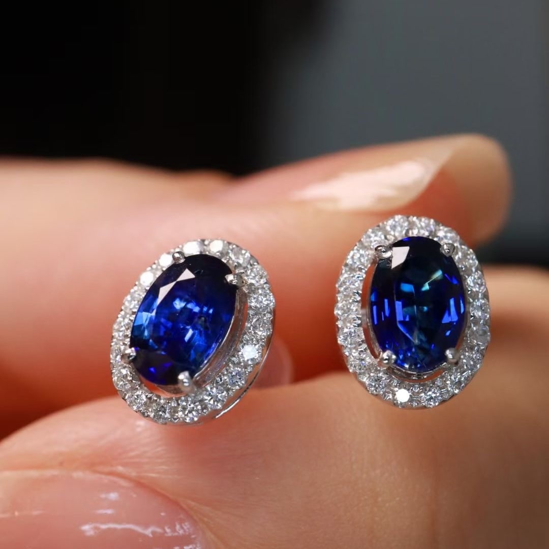 14k Gold 1.43 Ctw Natural Sapphire & Diamond Earrings: Ref:230999237 // gold content:14k gold // main gemstone:sapphire // shape:oval // carat weight:1. 25ct // color:royal blue // treatment:natural // // adjacent gemstone 2 : diamond // shape:round //