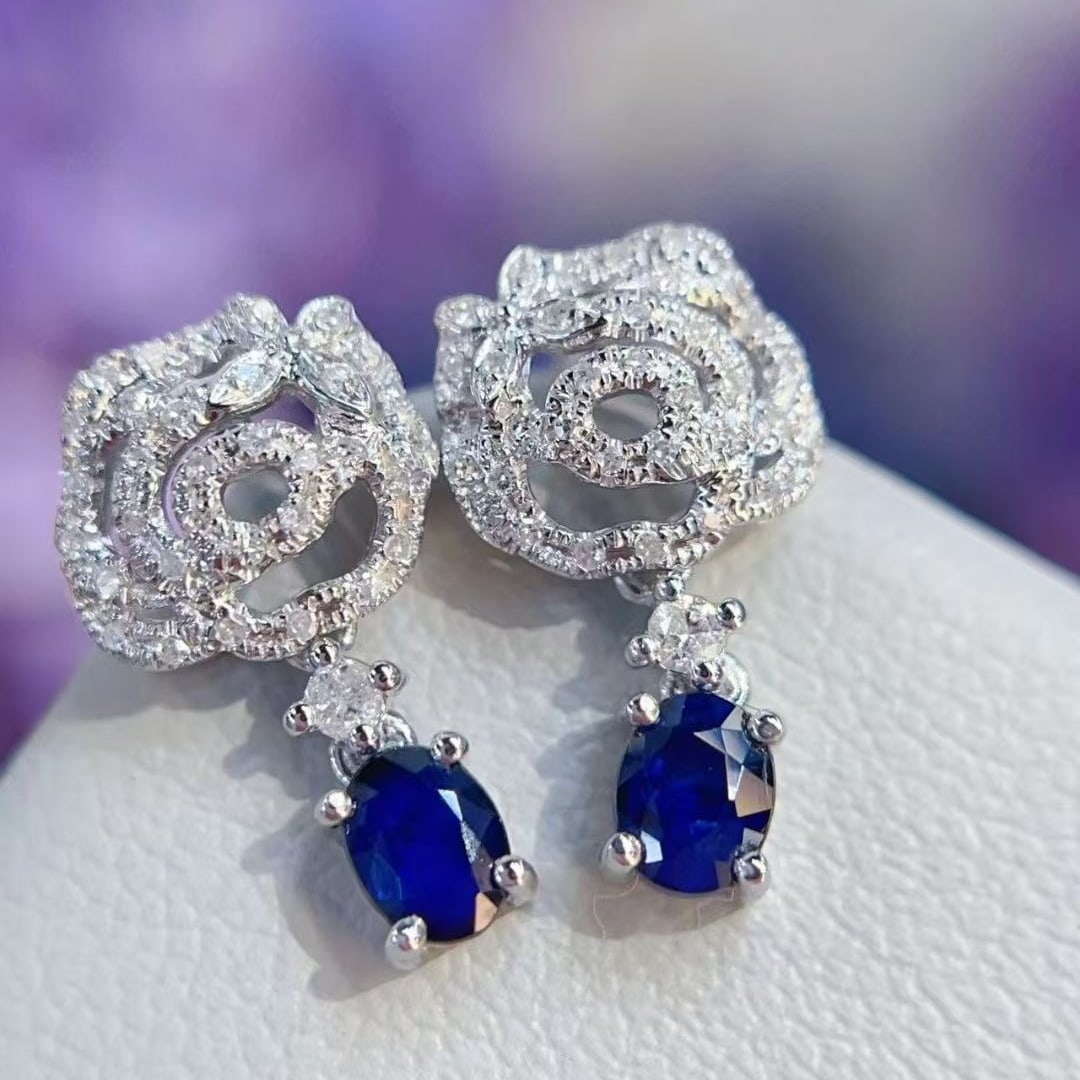 14k Gold 0.5 Ct Natural Sapphire & Diamond Earrings: Ref:230999240 // gold content:14k gold // main gemstone:sapphire // shape:oval // carat weight:0. 5ct // color:royal blue // treatment:natural // // adjacent gemstone 2 : diamond // shape:round //