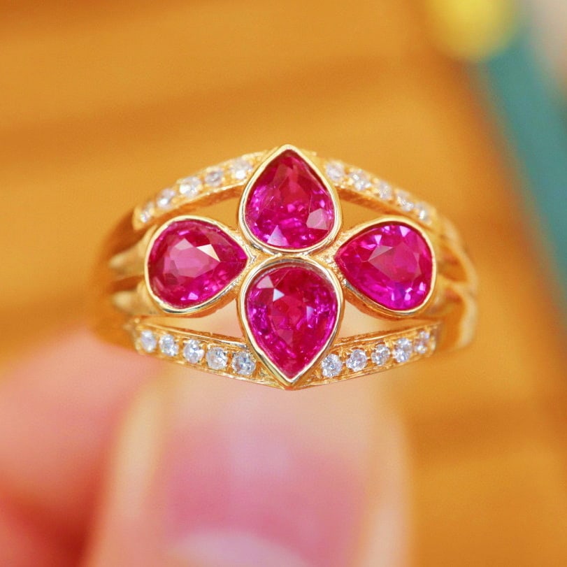14k Gold 1.40 Ctw Natural Ruby & Diamond Ring: Ref:230999249 // gold content:14k gold // ring size:7. 25us // // main gemstone:ruby // shape:pear // carat weight:1. 30ct // color:red // treatment:natural // // adjacent gemstone 2 : diamond //