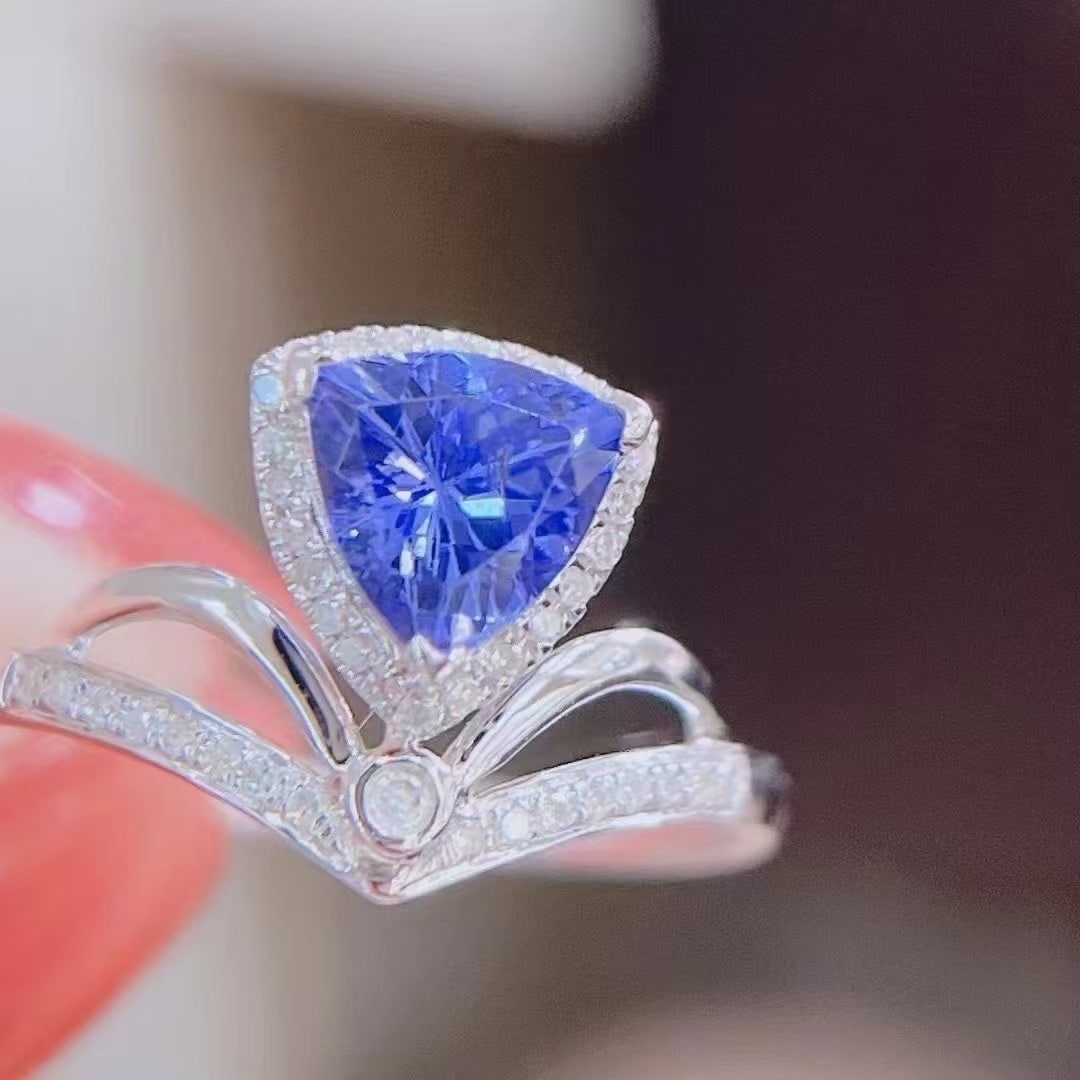 14k Gold 1.41 Ctw Natural Tanzanite & Diamond Ring: Ref:230999256 // gold content:14k gold // ring size:7. 25us // // main gemstone:tanzanite // shape:triangle // carat weight:1ct // color:blue // treatment:natural // // adjacent gemstone 2 : diamond