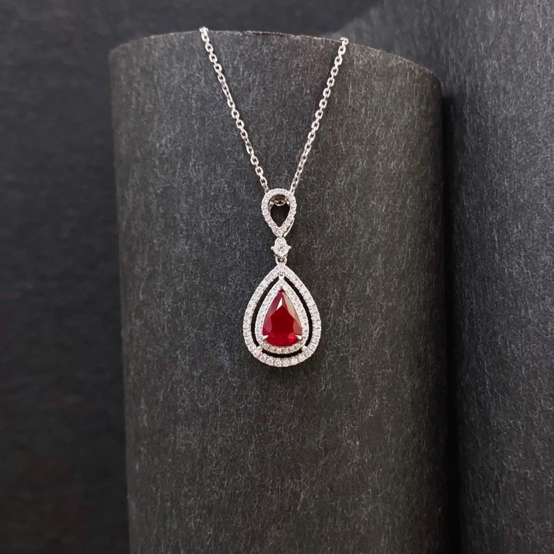 14k Gold 1.25 Ctw Natural Ruby & Diamond Pendant( Without Chain ): Ref:231000031 // gold content:14k gold // main gemstone:ruby // shape:pear // carat weight:1. 02ct // color:pigeonblood red // treatment:natural // // adjacent gemstone 2 : diamond // shape:round //