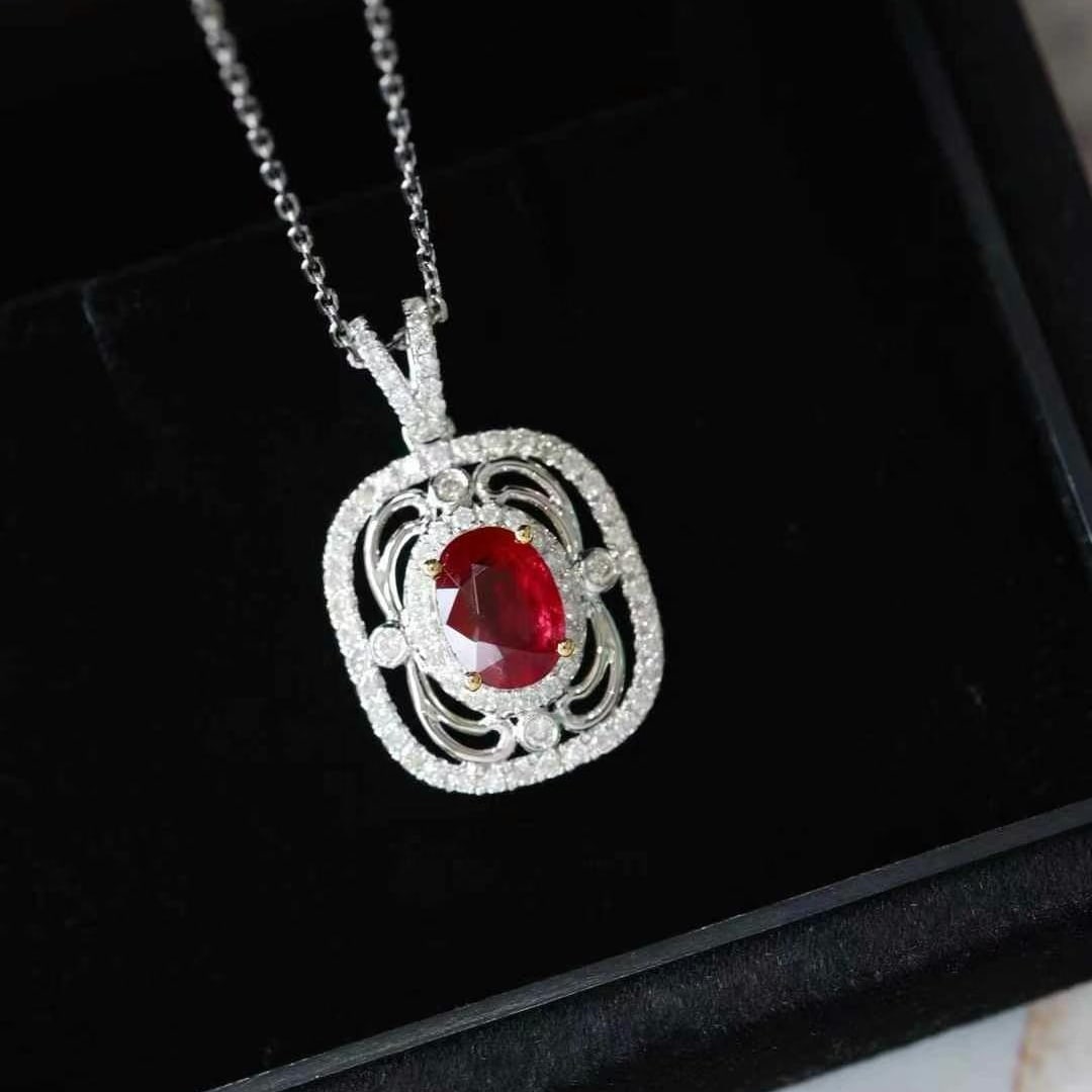 14k Gold 1.29 Ctw Vivid Red Natural Ruby & Diamond Pendant( Without Chain ): Ref:231000046 // gold content:14k gold // main gemstone:ruby // shape:oval // carat weight:0. 94ct // color:vivid red // treatment:natural // // adjacent gemstone 2 : diamond // shape:round // carat