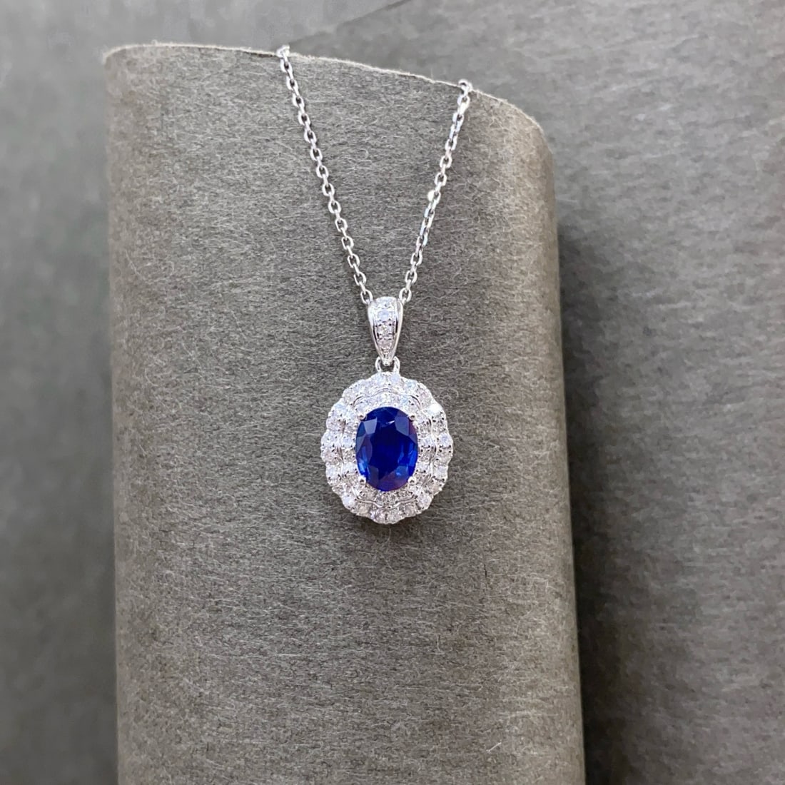 14k Gold 1.23 Ctw Natural Sapphire & Diamond Pendant( Without Chain ): Ref:231000062 // gold content:14k gold // main gemstone:sapphire // shape:oval // carat weight:0. 95ct // color:royal blue // treatment:natural // // adjacent gemstone 2 : diamond // shape:round //