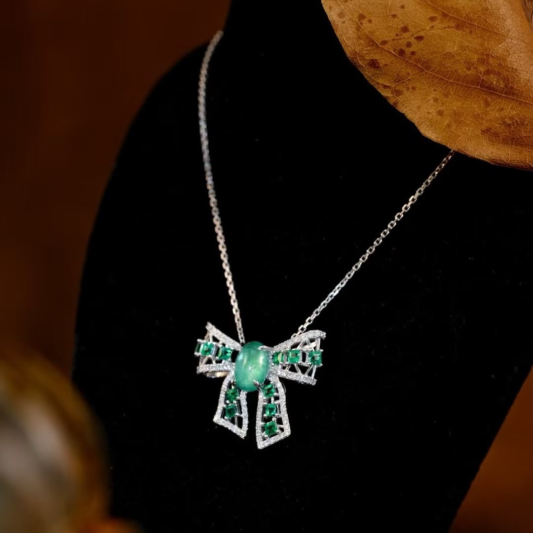 14k Gold 1.81 Ctw Natural Emerald & Diamond Pendant( Without Chain ): Ref:231000084 // gold content:14k gold // main gemstone:emerald // shape:oval // carat weight:1. 51ct // color:green // treatment:natural // // adjacent gemstone 2 : diamond // shape:round // carat