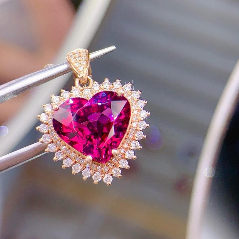 14k Gold 5.3 Ct Natural Tourmaline & Diamond Pendant( Without Chain ): Ref:231000147 // gold content:14k gold // main gemstone:tourmaline // shape:heart // carat weight:5. 3ct // color:red // treatment:natural // // adjacent gemstone 2 : diamond // shape:round //