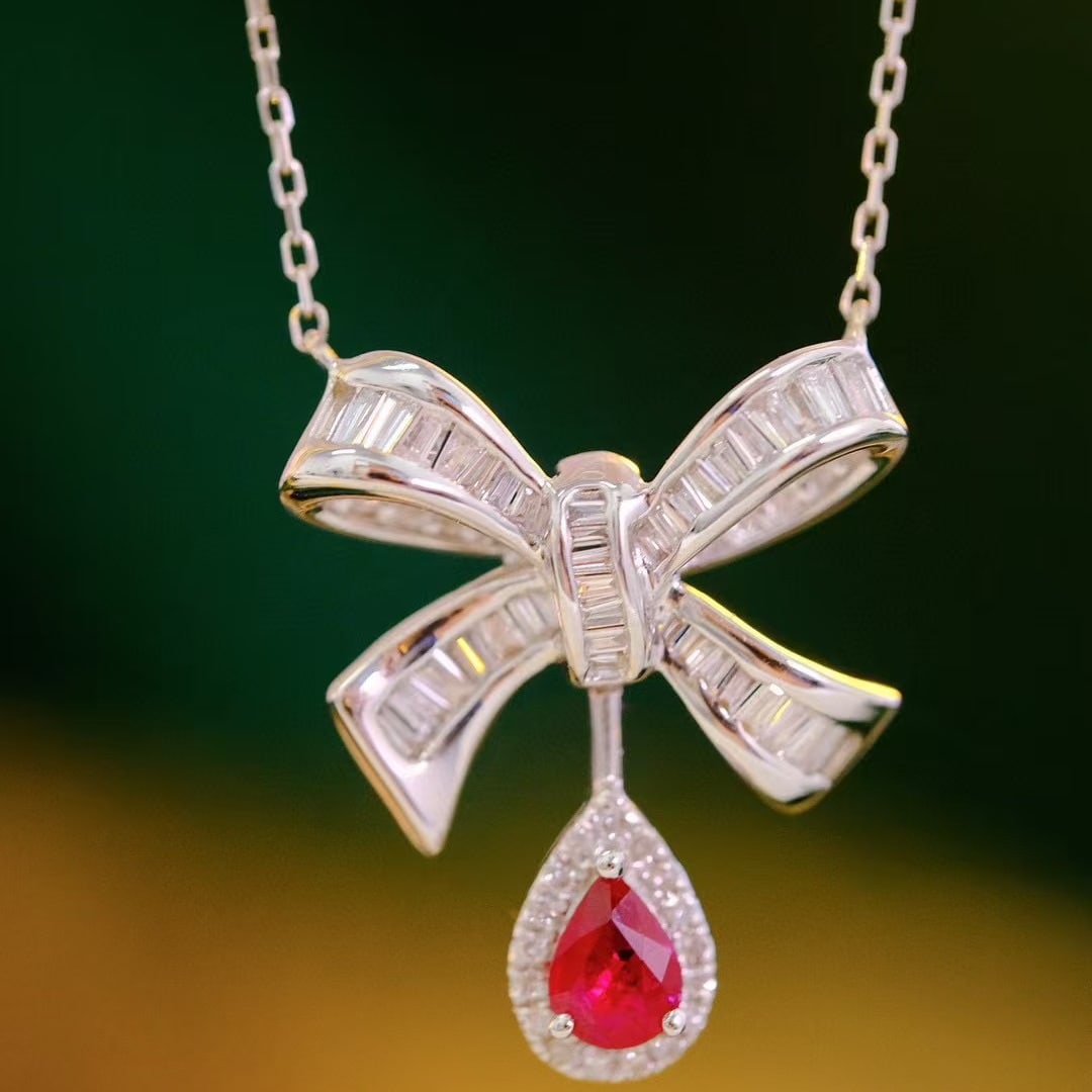 14k Gold 0.65 Ctw Natural Ruby & Diamond Necklace: Ref:231000161 // gold content:14k gold // main gemstone:ruby // shape:pear // carat weight:0. 25ct // color:red // treatment:natural // // adjacent gemstone 2 : diamond // shape:multiply // carat