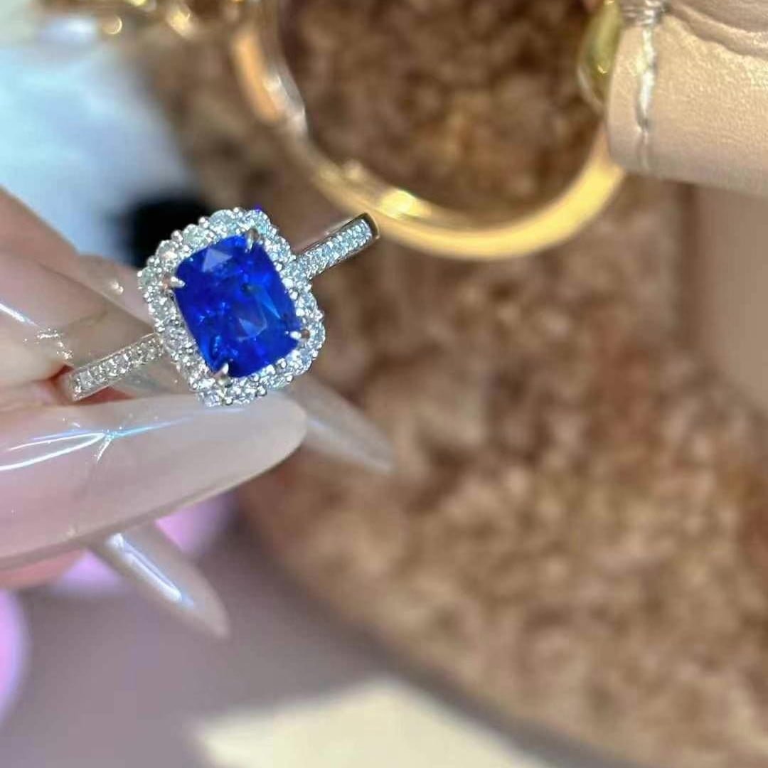 14k Gold 1.41 Ct Natural Sapphire & Diamond Ring: Ref:231000162 // gold content:14k gold // ring size:7. 25us // // main gemstone:sapphire // shape:cushion // carat weight:1. 41ct // color:royal blue // treatment:natural // // adjacent gemstone 2 : d