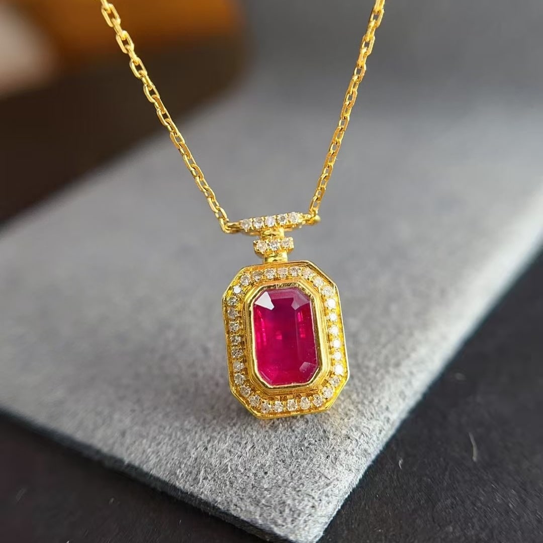 14k Gold 0.60 Ct Natural Ruby & Diamond Necklace: Ref:231000246 // gold content:14k gold // main gemstone:ruby // shape:octagonal // carat weight:0. 60ct // color:red // treatment:natural // // adjacent gemstone 2 : diamond // number of stones:37 //