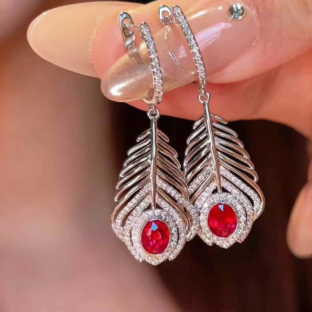 14k Gold 0.75 Ct Natural Ruby & Diamond Earrings: Ref:231000263 // gold content:14k gold // main gemstone:ruby // shape:oval // carat weight:0. 75ct // color:pigeonblood red // treatment:natural // // adjacent gemstone 2 : diamond // shape:round //