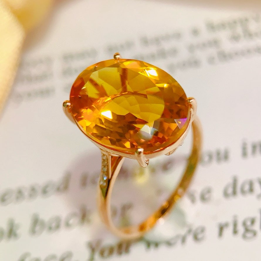 14k Gold 8.23 Ctw Natural Citrine & Diamond Ring: Ref:231000291 // gold content:14k gold // ring size:7. 25us // // main gemstone:citrine // shape:oval // carat weight:8. 2ct // color:yellow // treatment:natural // // adjacent gemstone 2 : diamond