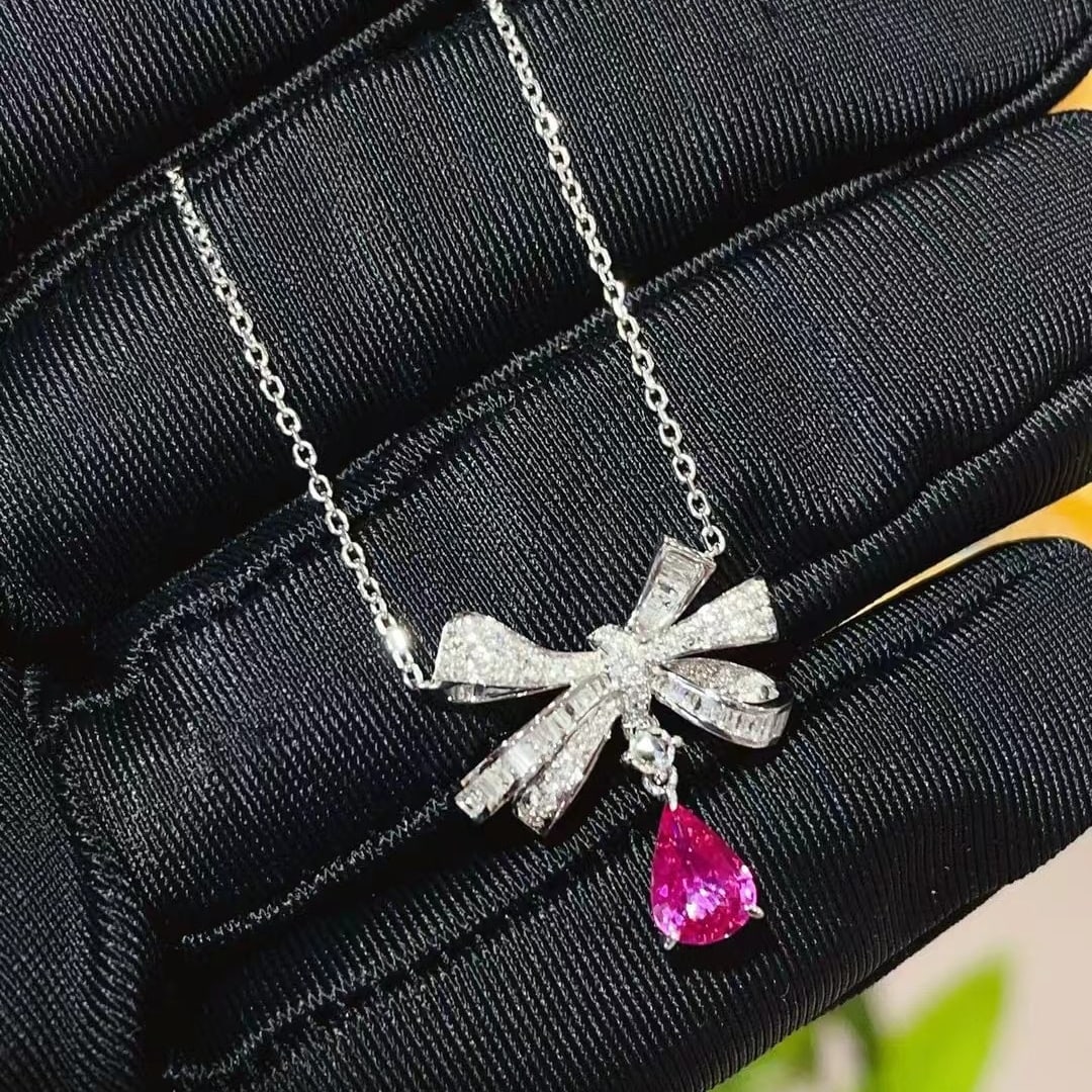 14k Gold 1.45 Ctw Natural Sapphire & Diamond Necklace: Ref:231000373 // gold content:14k gold // main gemstone:sapphire // shape:pear // carat weight:0. 95ct // color:pink // treatment:natural // // adjacent gemstone 2 : diamond // shape:multiply //