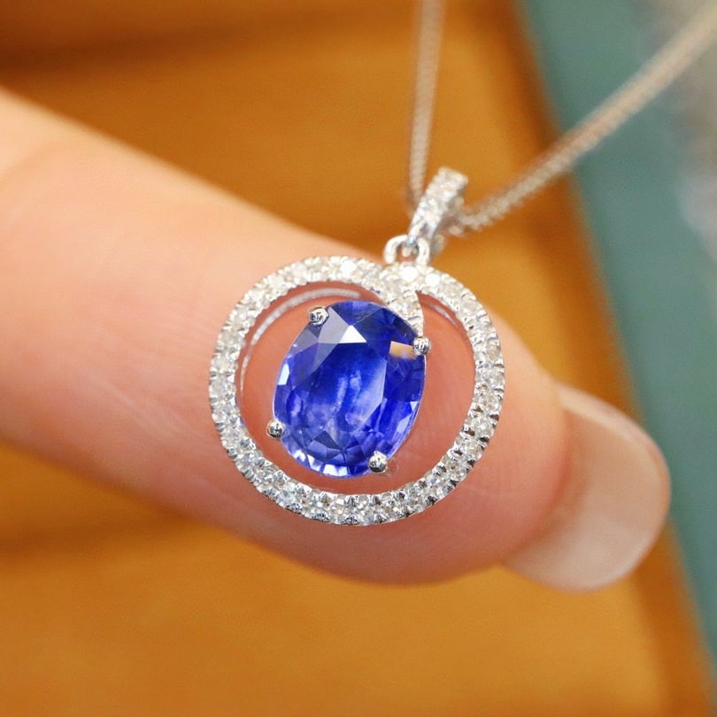 14k Gold 1.10 Ctw Natural Sapphire & Diamond Pendant( Without Chain ): Ref:231000389 // gold content:14k gold // main gemstone:sapphire // shape:oval // carat weight:0. 98ct // color:cornflower blue // treatment:natural // // adjacent gemstone 2 : diamond // number of