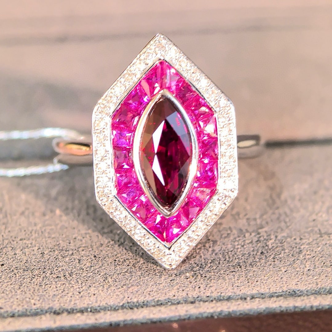 14k Gold 1.20 Ctw Natural Ruby & Diamond Ring: Ref:231000397 // gold content:14k gold // ring size:7. 25us // // main gemstone:ruby // shape:marquise // carat weight:1. 04ct // color:pigeonblood red // treatment:natural // // adjacent gemstone 2