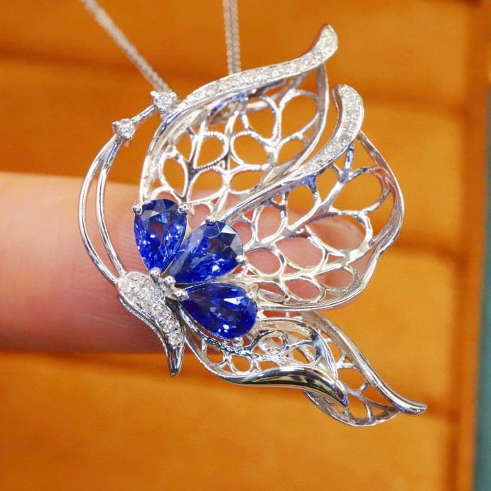14k Gold 1.54 Ctw Natural Sapphire & Diamond Pendant( Without Chain ): Ref:231000426 // gold content:14k gold // main gemstone:sapphire // shape:pear // carat weight:1. 43ct // color:blue // treatment:natural // // adjacent gemstone 2 : diamond // number of stones:32 //