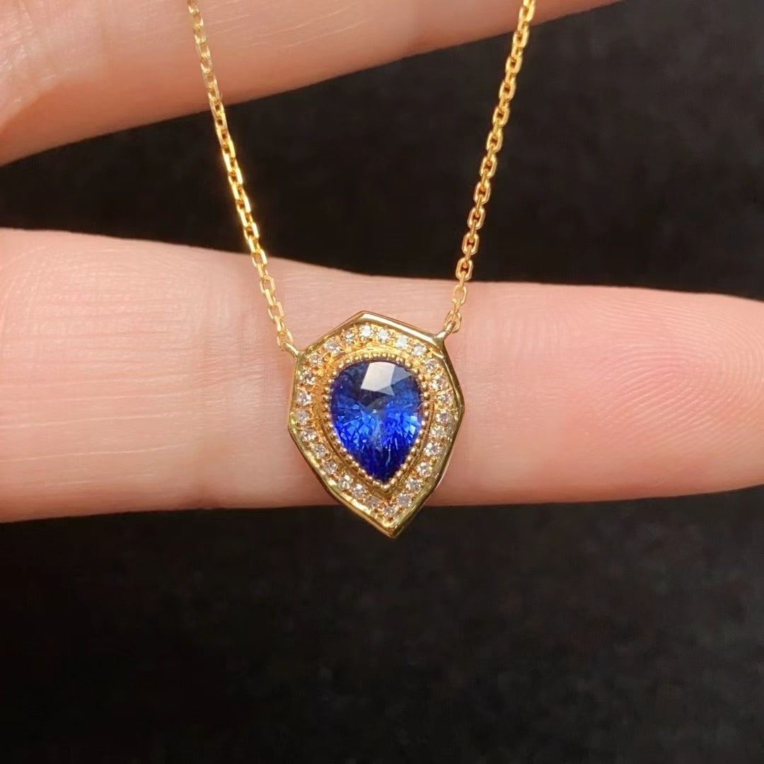 14k Gold 1.15 Ct Natural Sapphire & Diamond Necklace: Ref:231000431 // gold content:14k gold // main gemstone:sapphire // shape:pear // carat weight:1. 15ct // color:blue // treatment:natural // // adjacent gemstone 2 : diamond // number of stones:26 // 