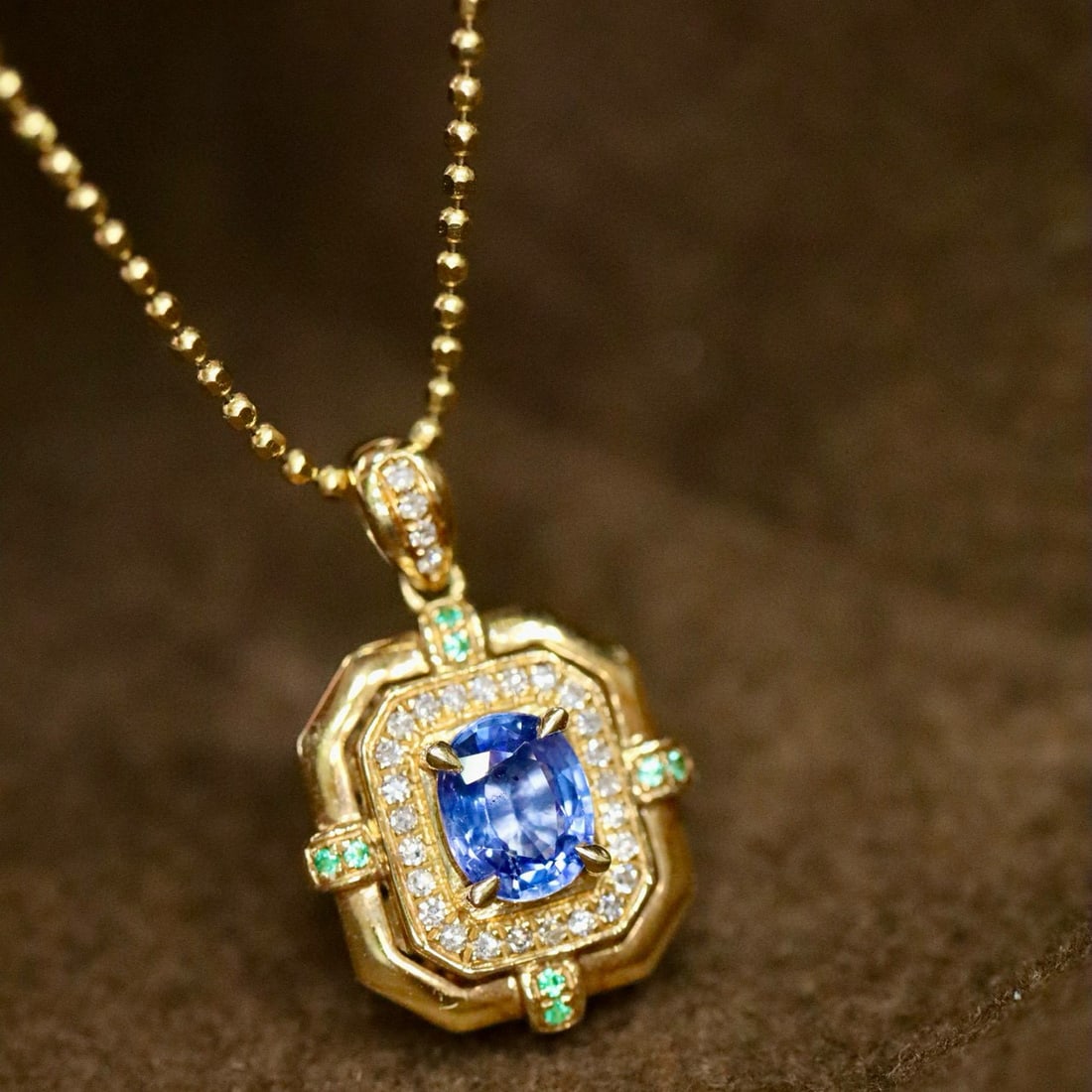 14k Gold 0.59 Ctw Natural Sapphire & Diamond Pendant( Without Chain ): Ref:231000433 // gold content:14k gold // main gemstone:sapphire // shape:oval // carat weight:0. 48ct // color:blue // treatment:natural // // adjacent gemstone 2 : diamond // shape:round // carat