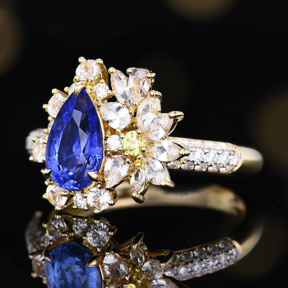 14k Gold 1.75 Ctw Natural Sapphire & Diamond Ring: Ref:231106352 // gold content:14k gold // ring size:7. 25us // // main gemstone:sapphire // shape:pear // carat weight:1. 4ct // color:cornflower blue // treatment:natural // // adjacent gemstone 2 : 