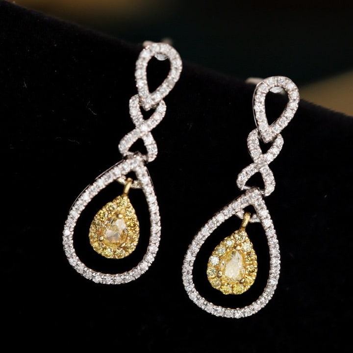 14k Gold 1.0 Ctw Natural Yellow Diamond & Diamond Earrings: Ref:231001010 // gold content:14k gold // main gemstone:yellow diamond // shape:pear // carat weight:0. 5ct // color:yellow // treatment:natural // // adjacent gemstone 2 : diamond // shape:round //