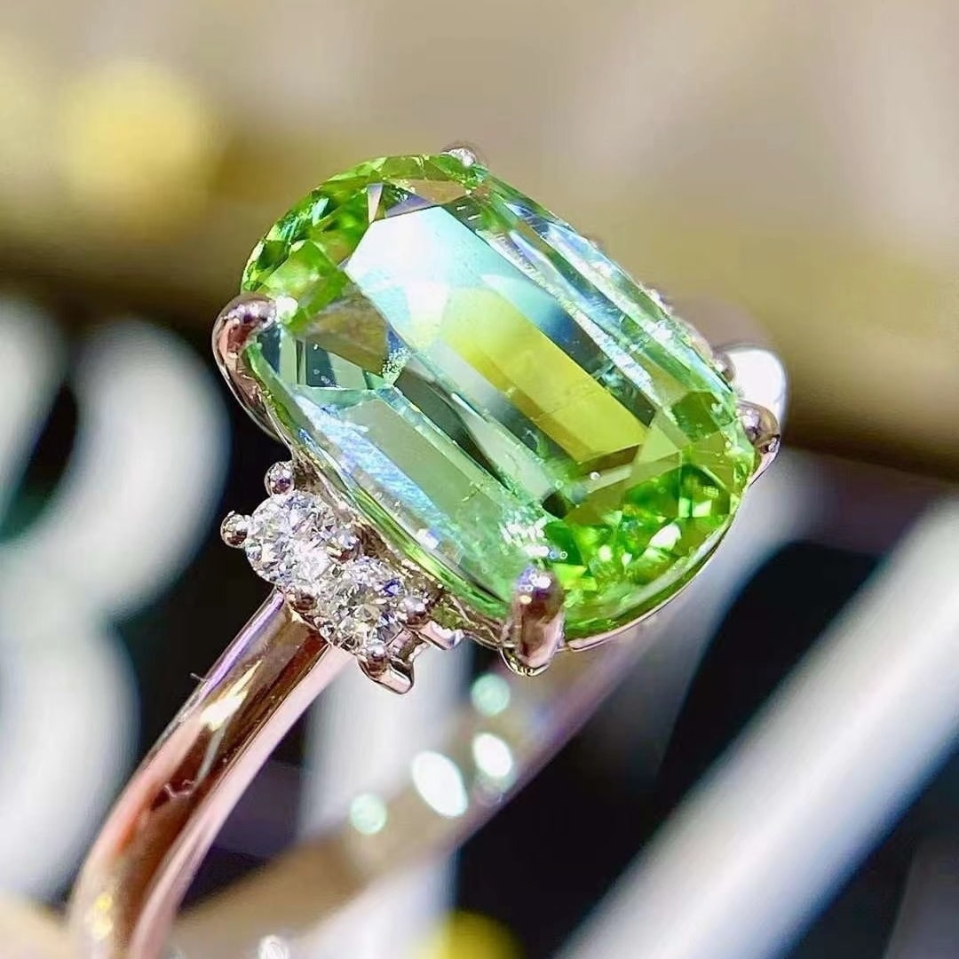14k Gold 2.18 Ctw Natural Tourmaline & Diamond Ring: Ref:231001046 // gold content:14k gold // ring size:7. 25us // // main gemstone:tourmaline // shape:cushion // carat weight:2. 1ct // color:green // treatment:natural // // adjacent gemstone 2 :