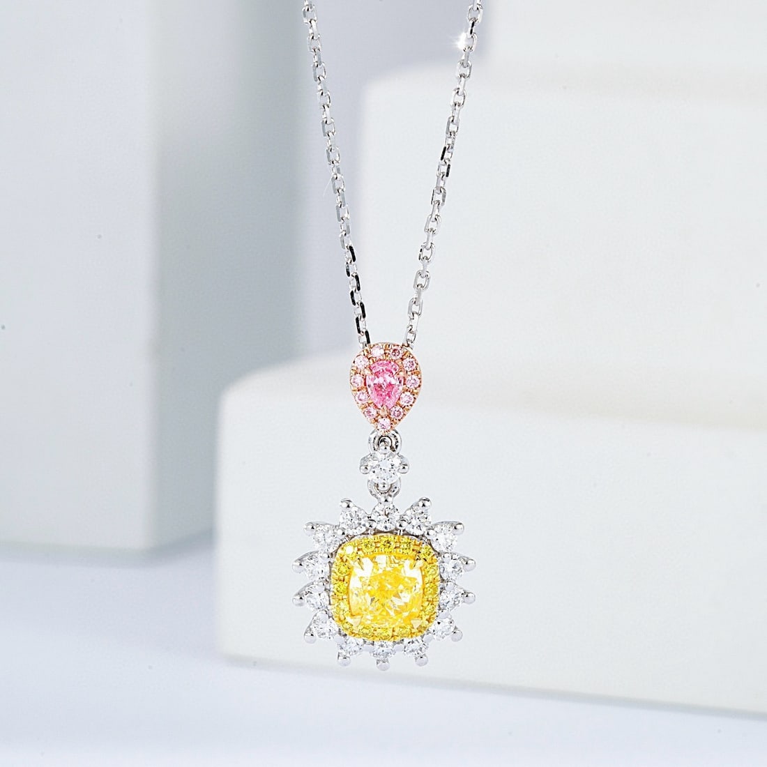 14k Gold 0.64 Ctw Natural Yellow Diamond & Pink Diamond Necklace: Ref:231001054 // gold content:14k gold // main gemstone:yellow diamond // shape:cushion // carat weight:0. 58ct // color:yellow // treatment:natural // // adjacent gemstone 2 : pink diamond // shape:p