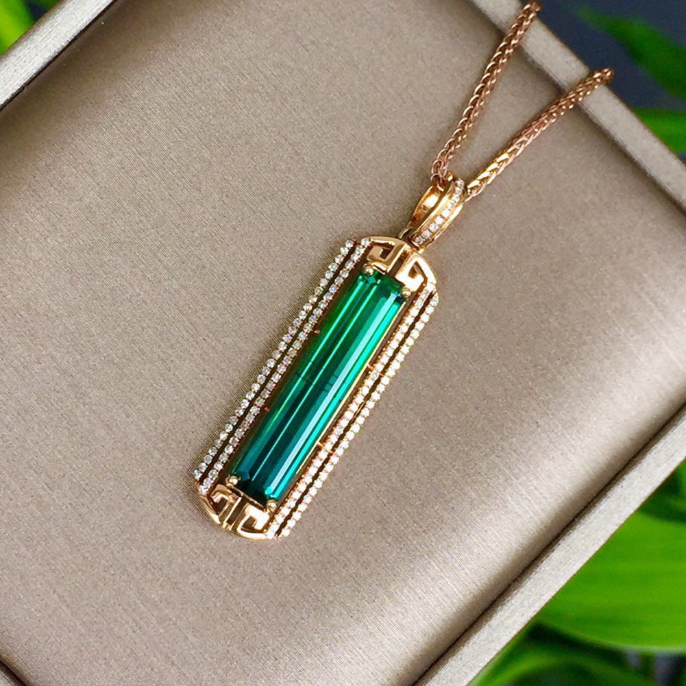 14k Gold 6.26 Ct Natural Tourmaline & Diamond Pendant( Without Chain ): Ref:231001082 // gold content:14k gold // main gemstone:tourmaline // shape:octagonal // carat weight:6. 26ct // color:bluish green // treatment:natural // // adjacent gemstone 2 : diamond // number