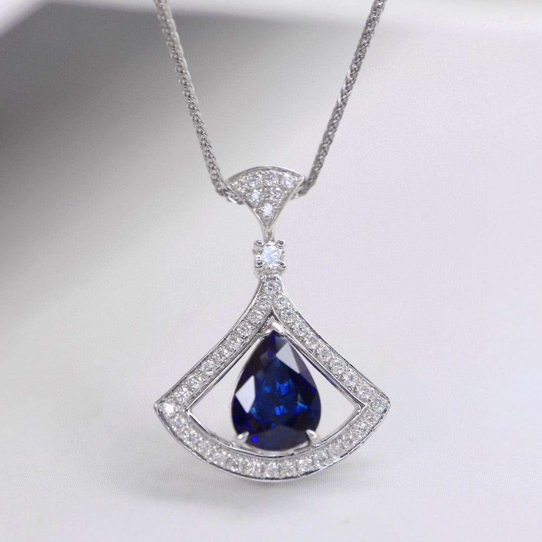 14k Gold 1.43 Ctw Natural Sapphire & Diamond Pendant( Without Chain ): Ref:231001123 // gold content:14k gold // main gemstone:sapphire // shape:pear // carat weight:1. 2ct // color:blue // treatment:natural // // adjacent gemstone 2 : diamond // shape:round // carat