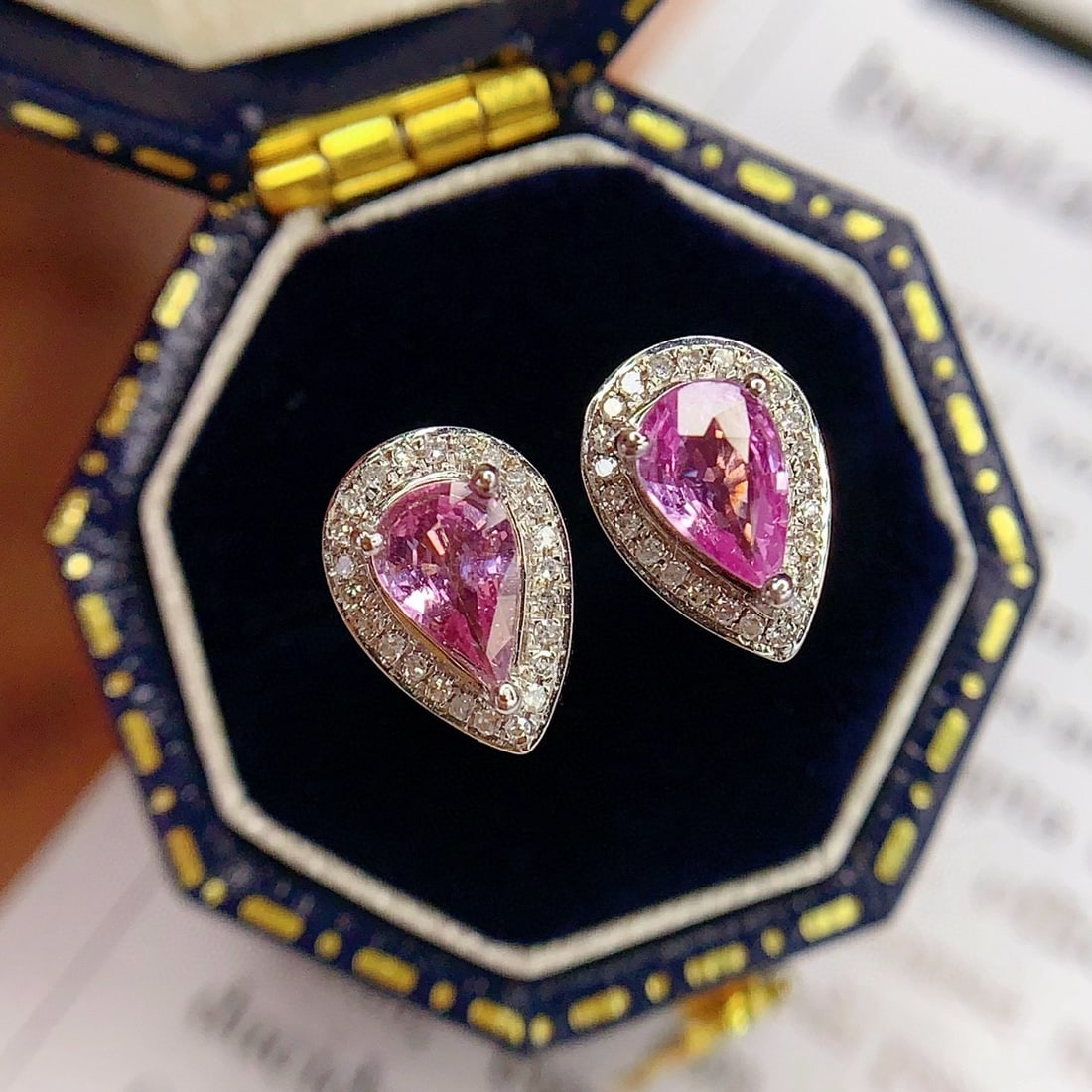 14k Gold 1.00 Ct Natural Sapphire & Diamond Earrings: Ref:231001160 // gold content:14k gold // main gemstone:sapphire // shape:pear // carat weight:1. 00ct // color:pink // treatment:natural // // adjacent gemstone 2 : diamond // number of stones:48 //