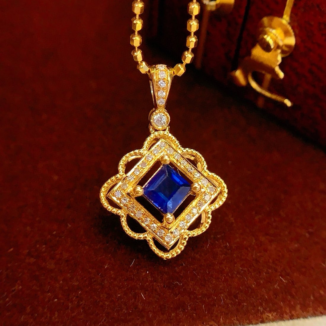 14k Gold 0.50 Ct Natural Sapphire & Diamond Pendant( Without Chain ): Ref:231001164 // gold content:14k gold // main gemstone:sapphire // shape:square // carat weight:0. 50ct // color:blue // treatment:natural // // adjacent gemstone 2 : diamond // number of stones:34