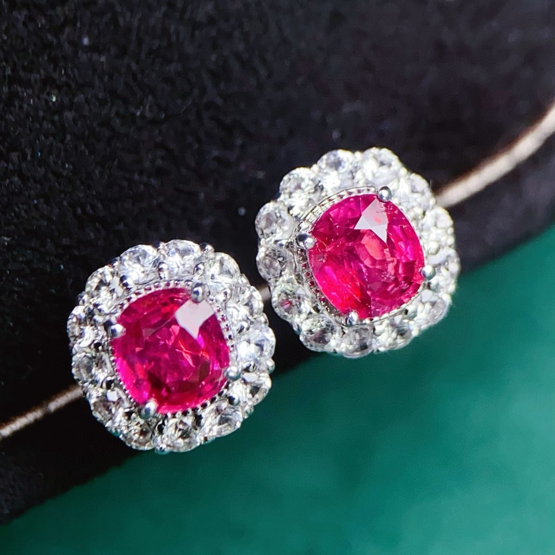 14k Gold 1.3 Ct Natural Ruby & Sapphire Earrings: Ref:231001191 // gold content:14k gold // main gemstone:ruby // shape:cushion // carat weight:1. 3ct // color:red // treatment:natural // // adjacent gemstone 2 : sapphire // number of stones:26 //