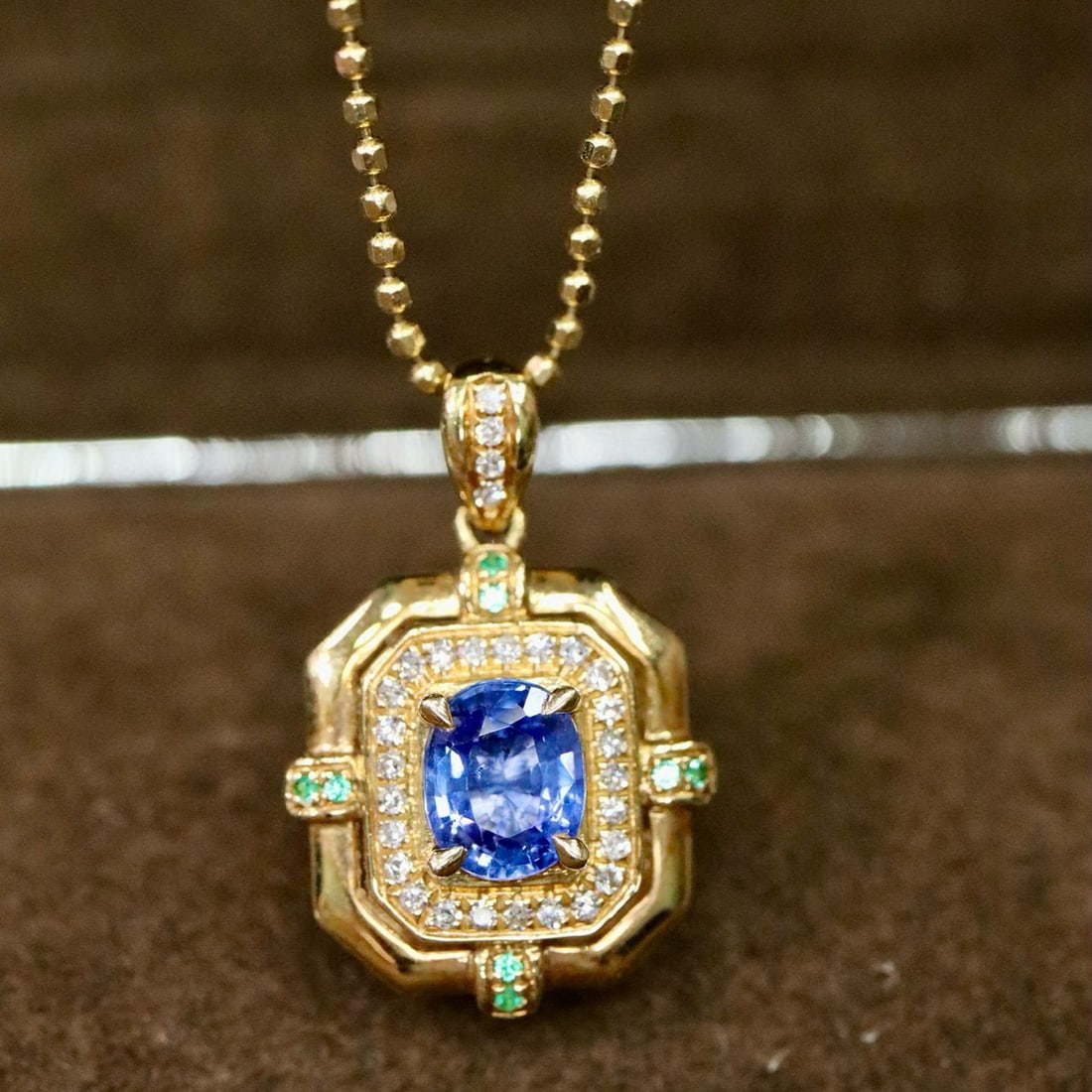 14k Gold 0.59 Ctw Natural Sapphire & Diamond Pendant( Without Chain ): Ref:231001215 // gold content:14k gold // main gemstone:sapphire // shape:oval // carat weight:0. 48ct // color:blue // treatment:natural // // adjacent gemstone 2 : diamond // shape:round // carat